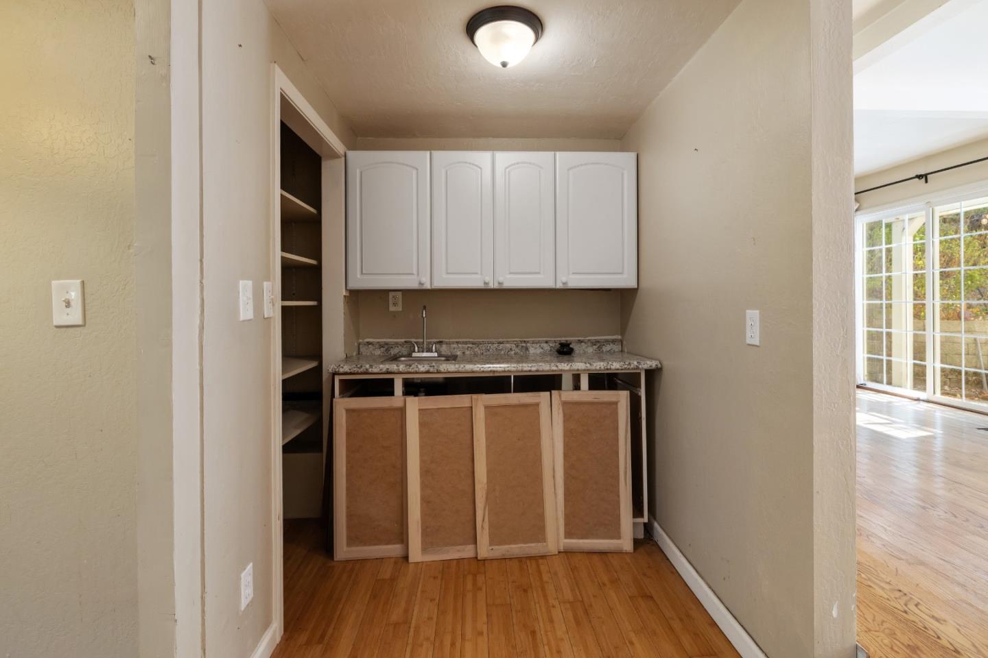 600 Cook Way Ben Lomond, CA 95005 - Photo 17 of 85 a kitchen with stainless steel appliances granite countertop a refrigerator and a stove top oven