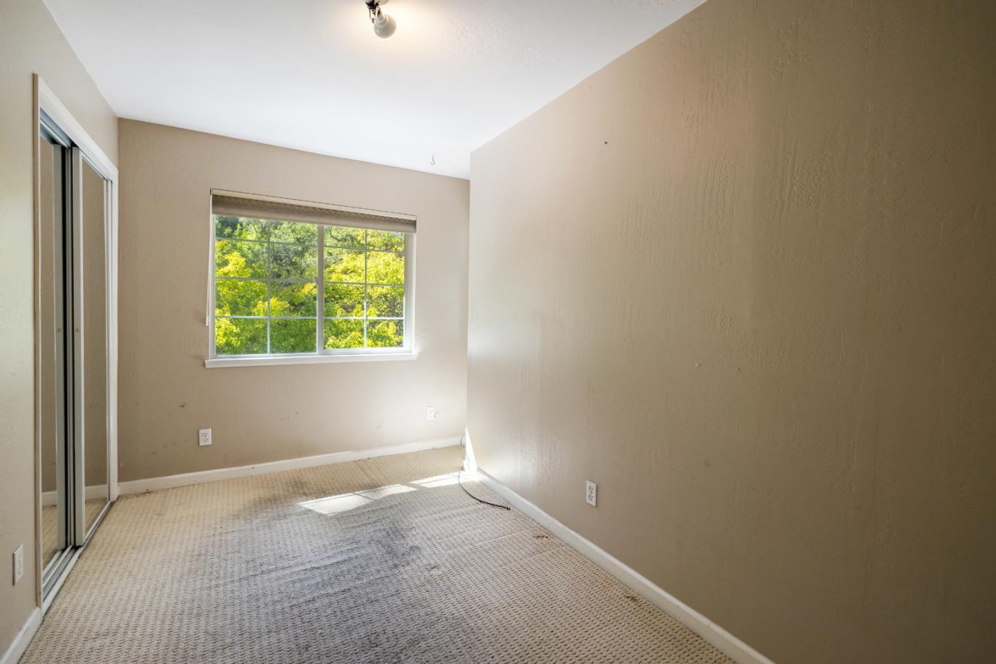 600 Cook Way Ben Lomond, CA 95005 - Photo 18 of 85 an empty room with windows