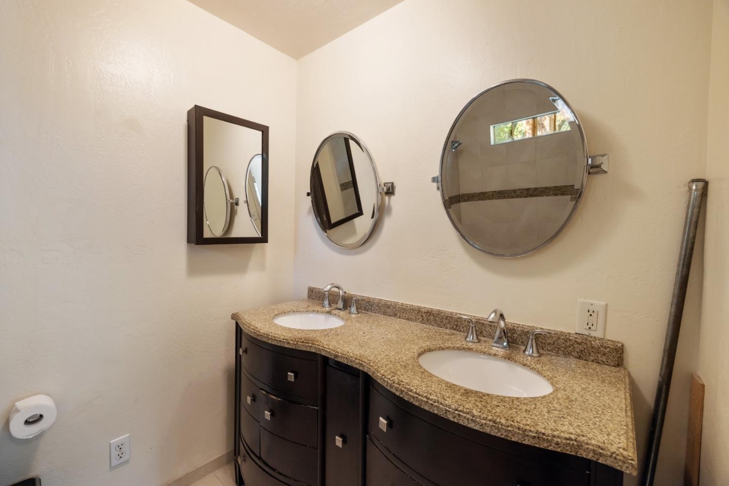600 Cook Way Ben Lomond, CA 95005 - Photo 26 of 85 a bathroom with a granite countertop double vanity sinks and a mirror