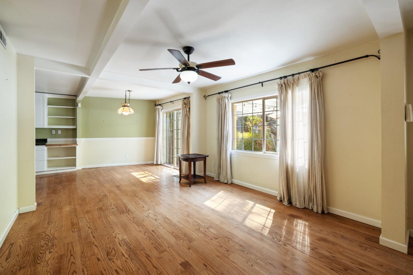 600 Cook Way Ben Lomond, CA 95005 - Photo 3 of 85 a view of empty room with wooden floor and fan
