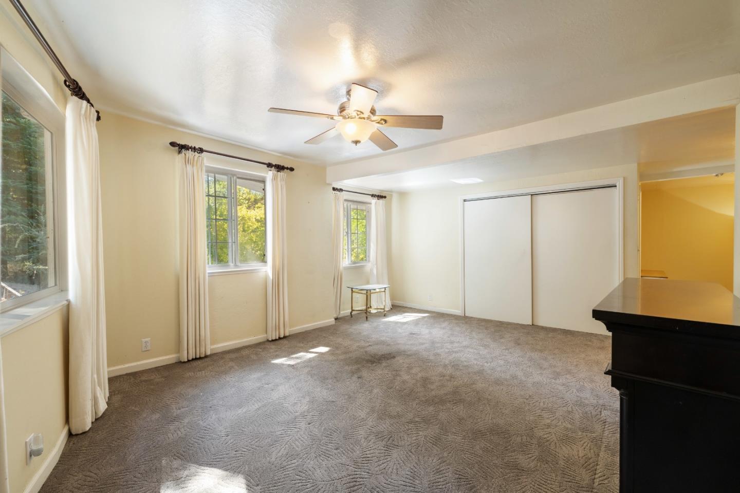 600 Cook Way Ben Lomond, CA 95005 - Photo 31 of 85 an empty room with windows and fan