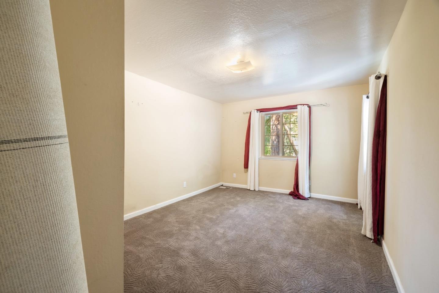 600 Cook Way Ben Lomond, CA 95005 - Photo 33 of 85 a view of an empty room with a window