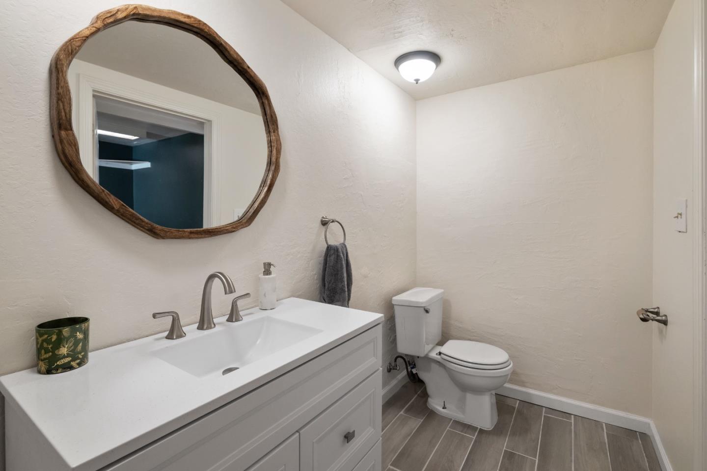 600 Cook Way Ben Lomond, CA 95005 - Photo 38 of 85 a white toilet sitting next to a bathroom sink