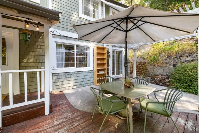 a view of an outdoor space with furniture