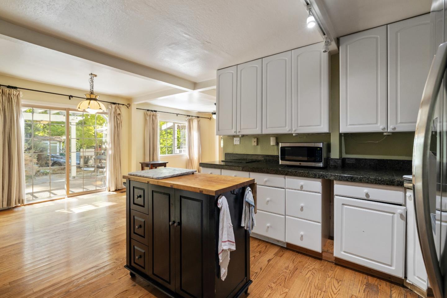 600 Cook Way Ben Lomond, CA 95005 - Photo 10 of 85 a kitchen with a sink stove and cabinets
