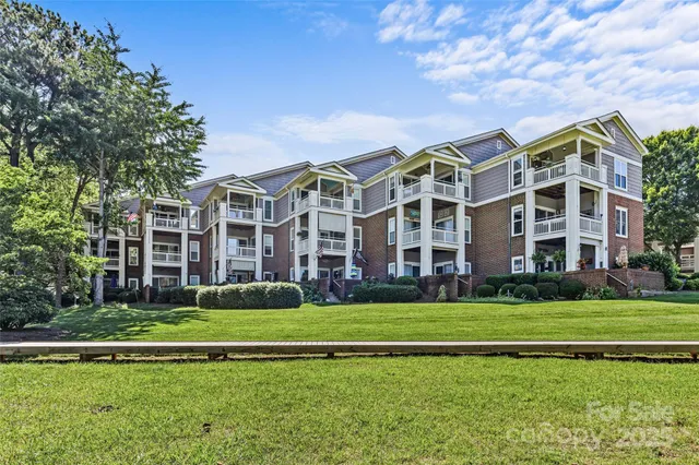 a view of a building with a yard