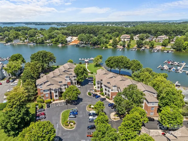 an aerial view of a city and lake view