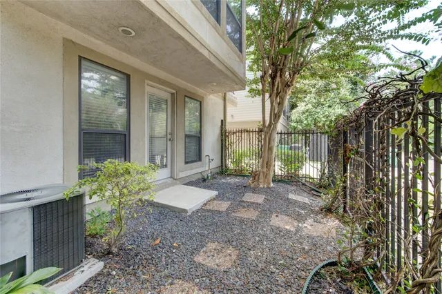 a view of a house with a garden