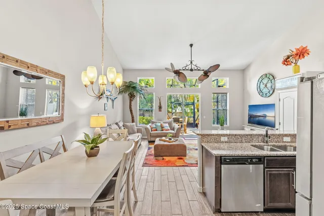 a bedroom with a bed and ceiling fan