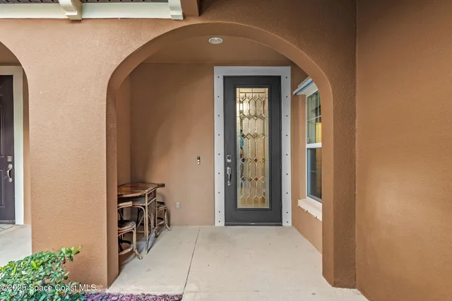 a view of room with wooden floor and outdoor seating