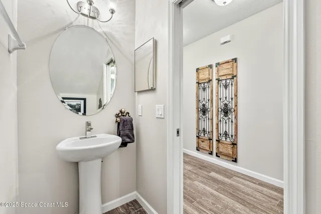a kitchen with stainless steel appliances kitchen island granite countertop a sink and cabinets