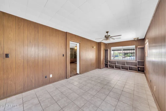 a view of an empty room and window