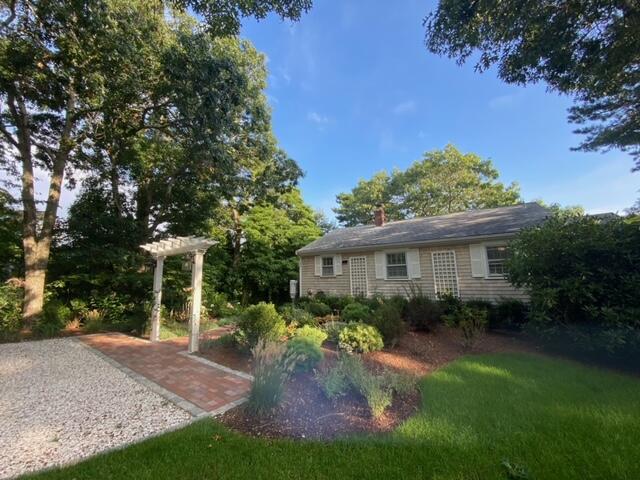 27 Uncatena Road Mashpee, MA 02649 - Photo 2 of 50 a view of backyard of house with green space