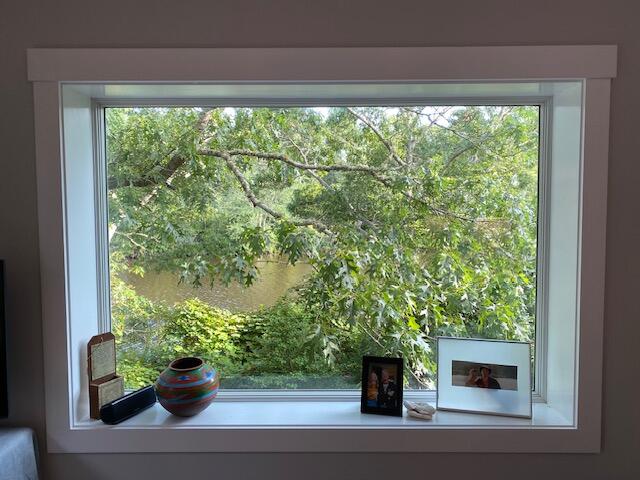 27 Uncatena Road Mashpee, MA 02649 - Photo 3 of 50 a potted plant sitting in front of a window
