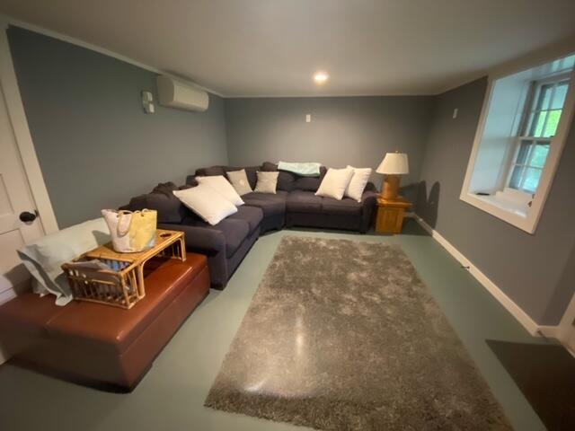 27 Uncatena Road Mashpee, MA 02649 - Photo 34 of 50 a living room with furniture