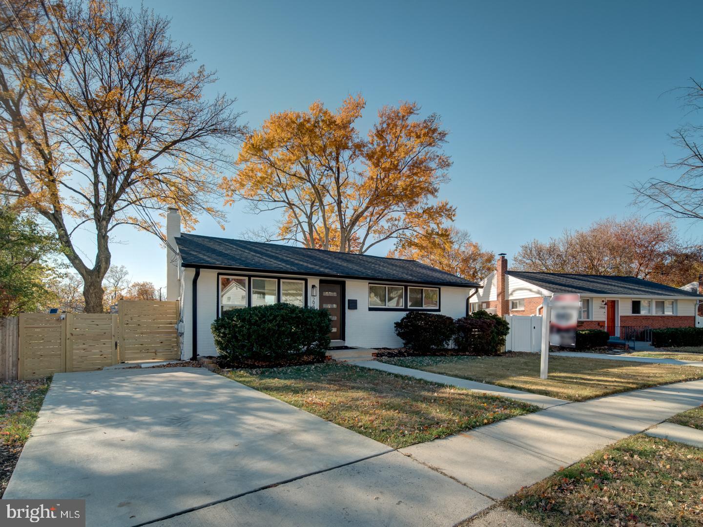 2906 Radius Road Silver Spring, MD 20902 - Photo 1 of 43 a front view of a house with garden