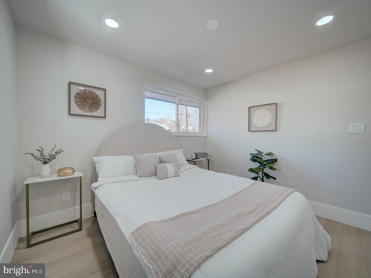 2906 Radius Road Silver Spring, MD 20902 - Photo 22 of 43 a bedroom with a bed and a window