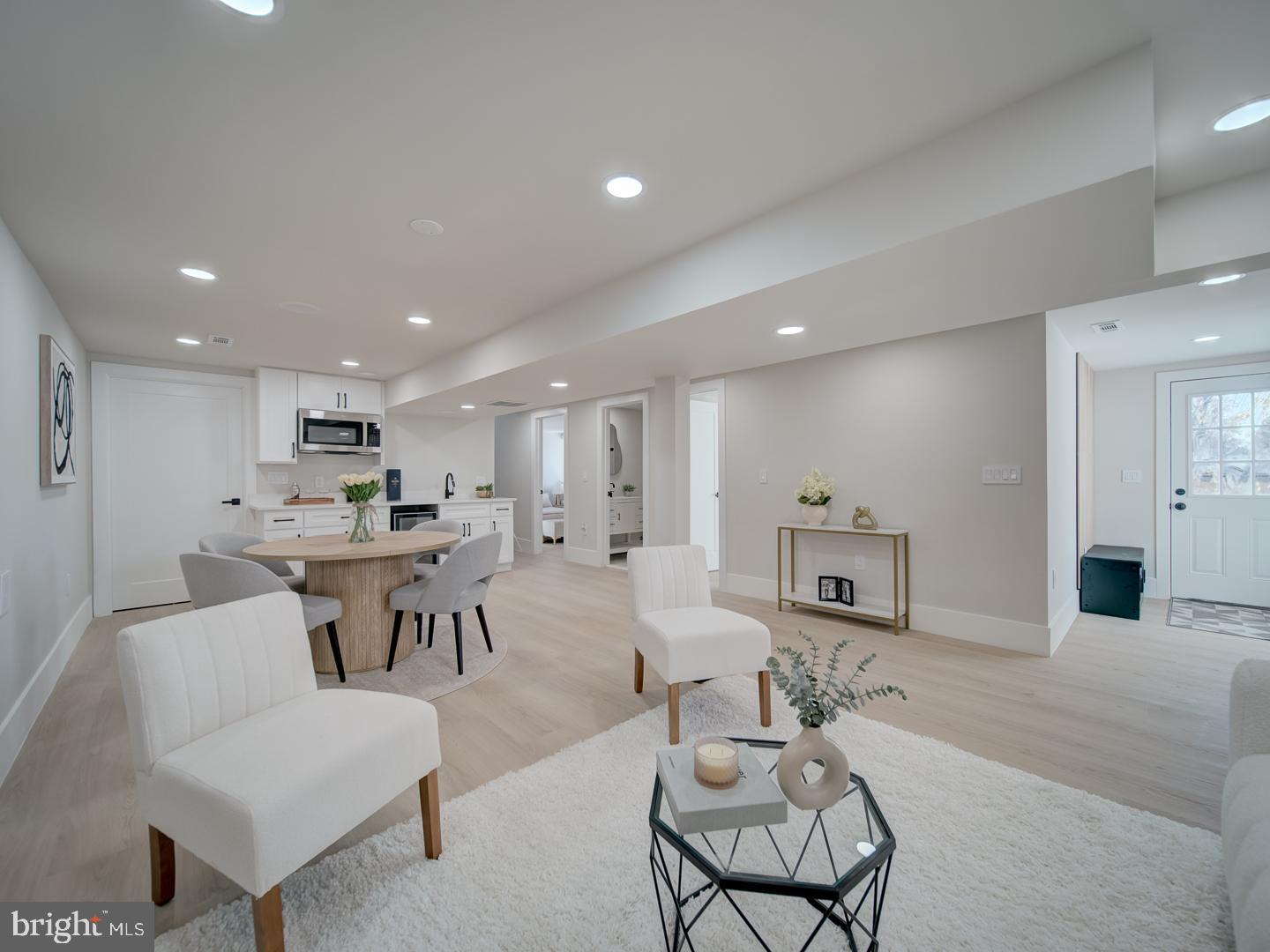 2906 Radius Road Silver Spring, MD 20902 - Photo 26 of 43 a living room with furniture kitchen and a table