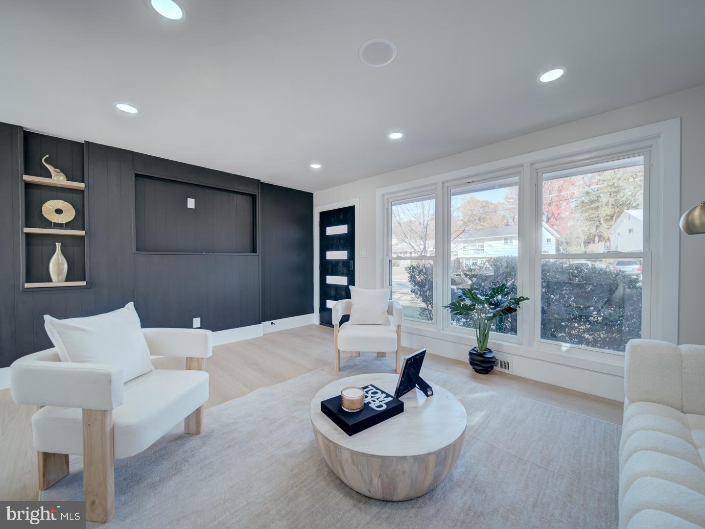 2906 Radius Road Silver Spring, MD 20902 - Photo 6 of 43 a living room with furniture and a large window