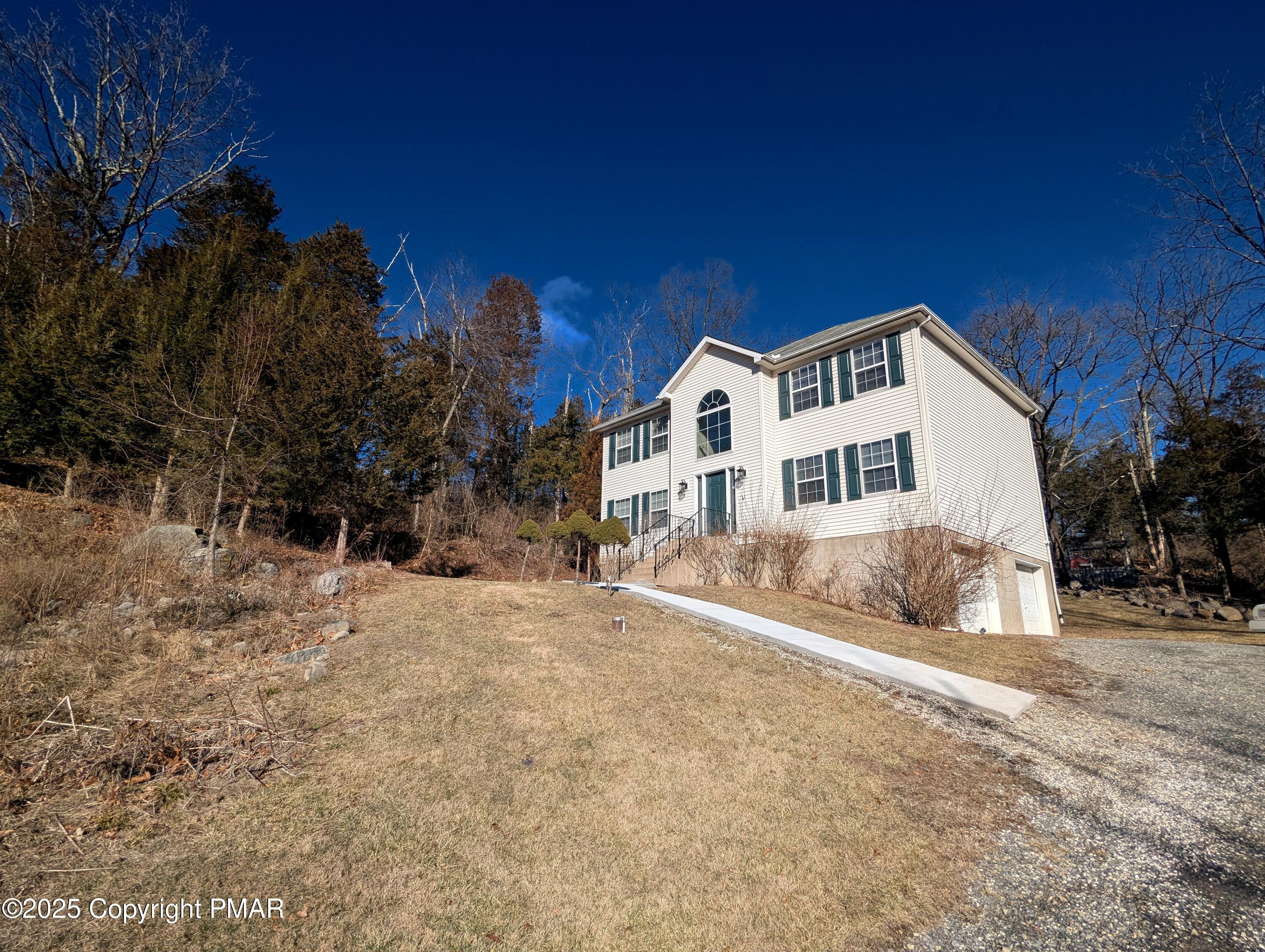 1603 Rachel Road Stroudsburg, PA 18360 - Photo 1 of 33 a view of a house with a yard