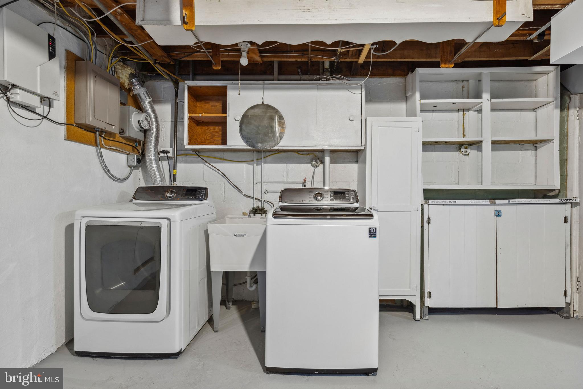 3418 Dunran Road Baltimore, MD 21222 - Photo 16 of 19 a utility room with dryer and washer