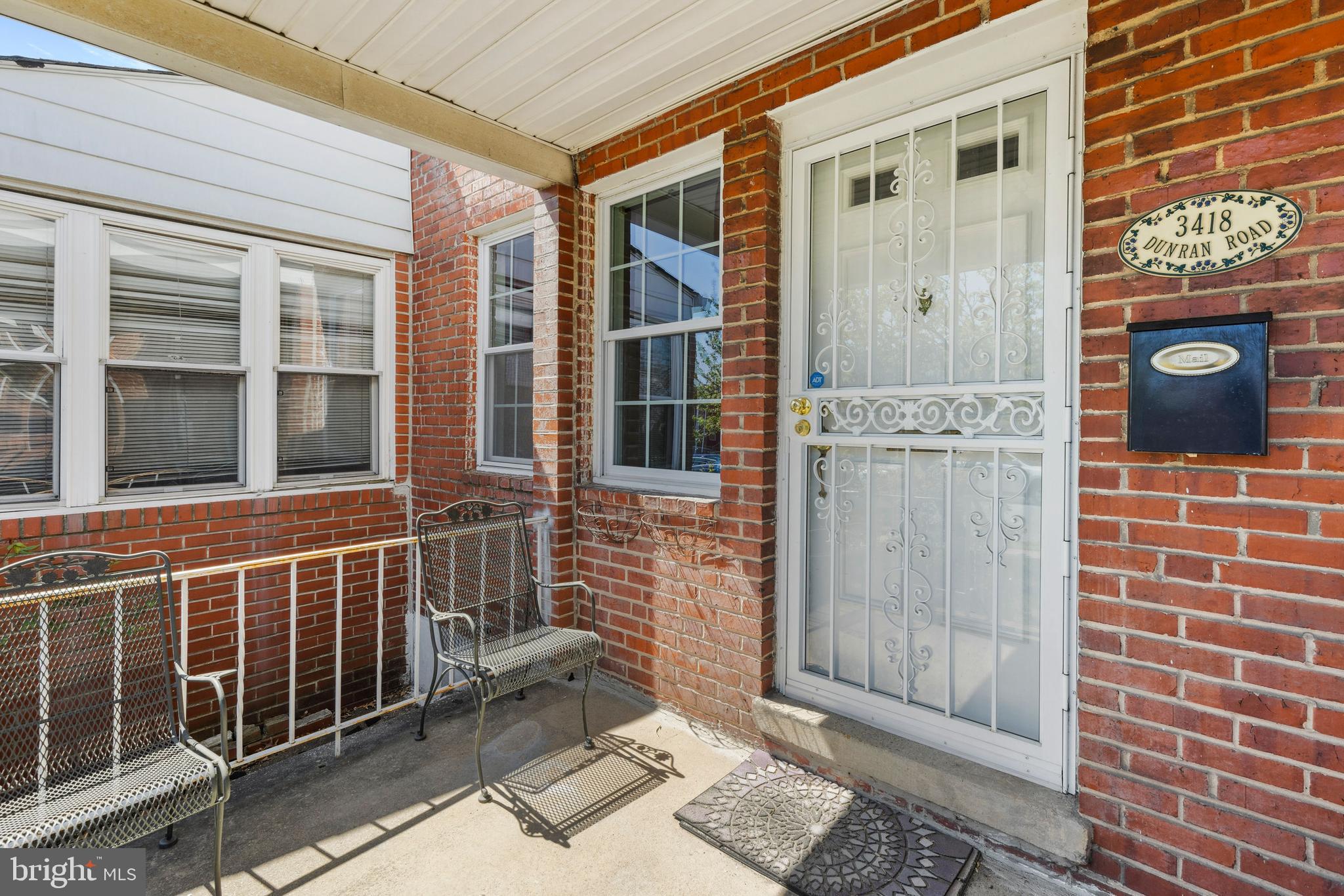 3418 Dunran Road Baltimore, MD 21222 - Photo 17 of 19 a view of front door of house with a glass door
