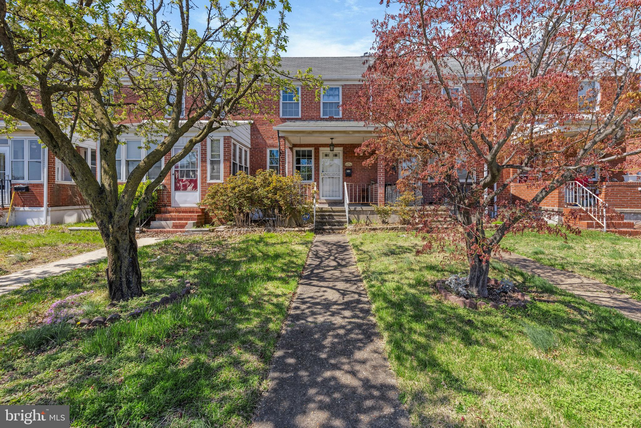 3418 Dunran Road Baltimore, MD 21222 - Photo 2 of 19 a front view of a house with garden
