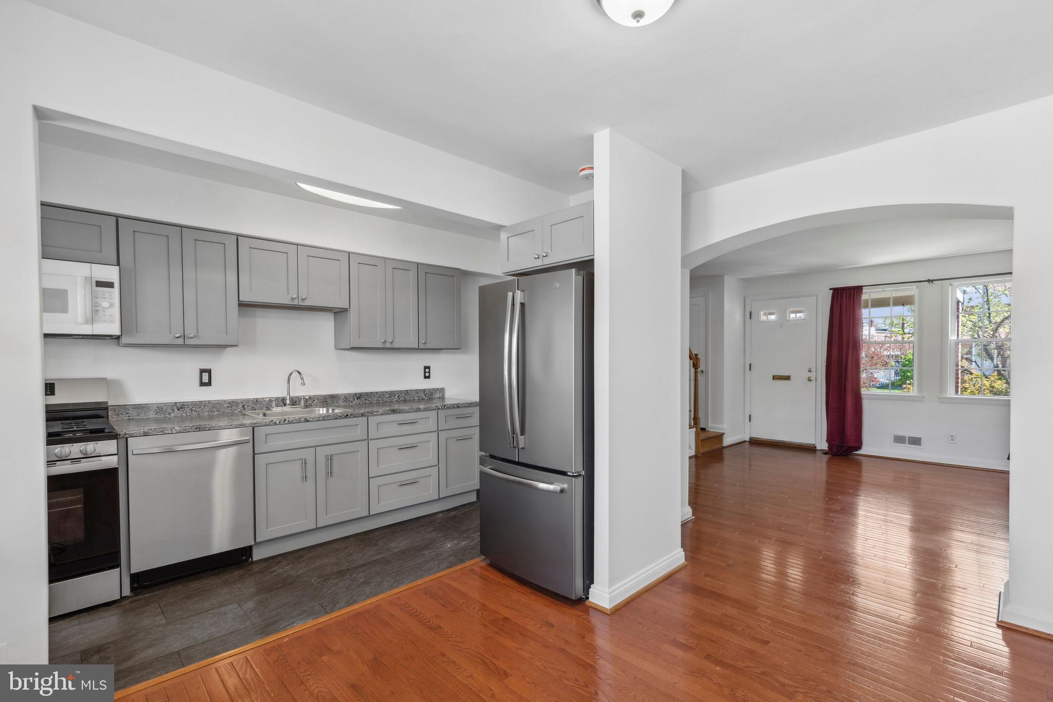 3418 Dunran Road Baltimore, MD 21222 - Photo 4 of 19 a kitchen with stainless steel appliances granite countertop a refrigerator and a stove