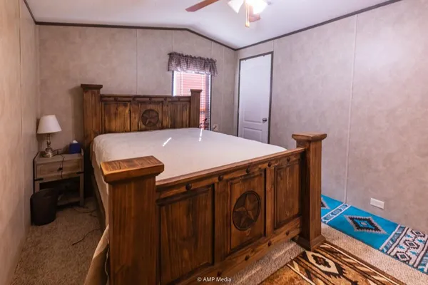 a close view of a sink and a refrigerator in a kitchen