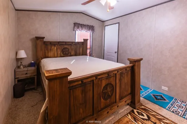 a close view of a sink and a refrigerator in a kitchen