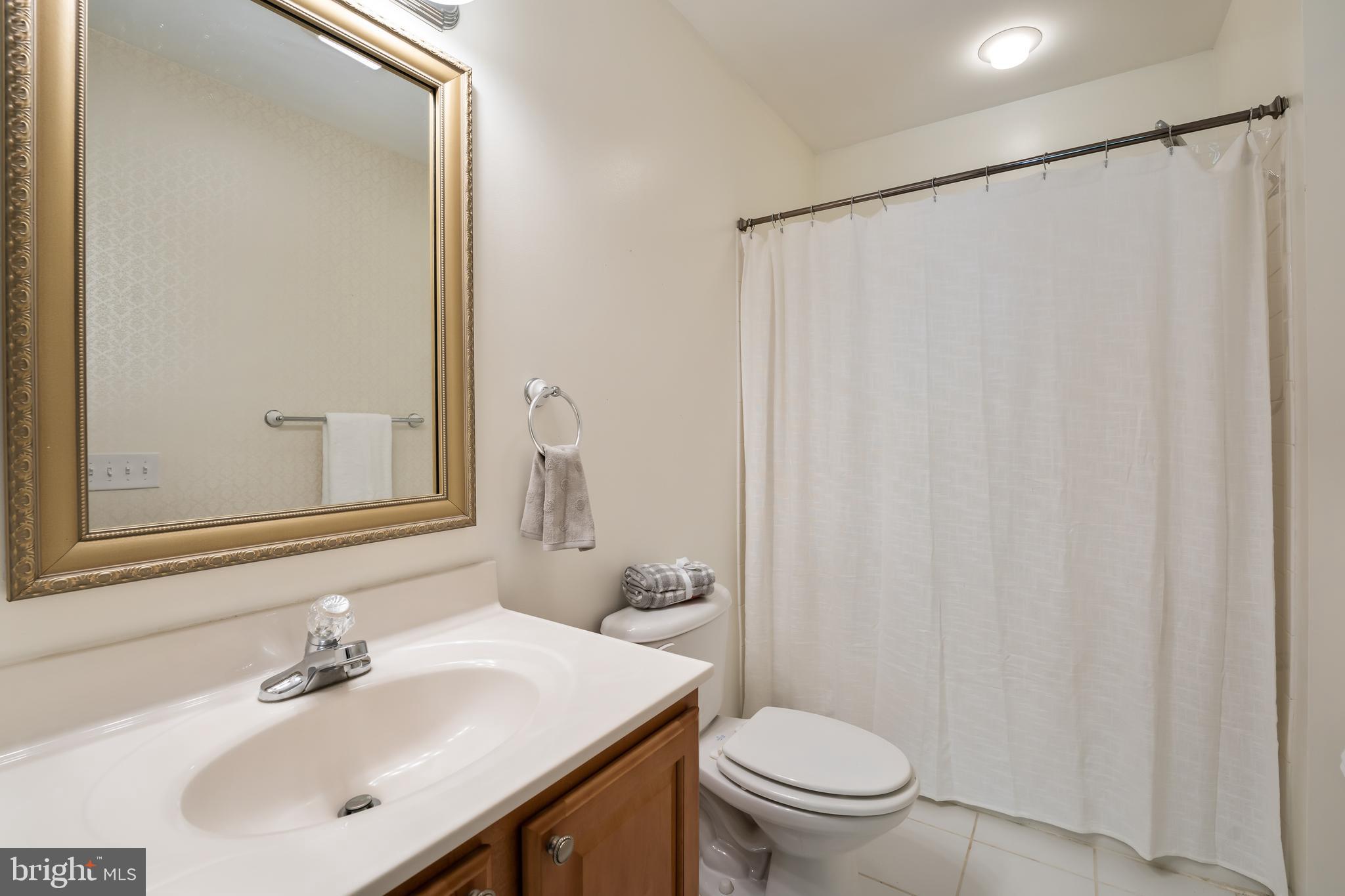 9361 Keyser Road Nokesville, VA 20181 - Photo 63 of 83 Hallway bathroom with tiled floor.