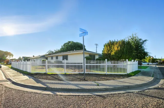 a view of a house with a park