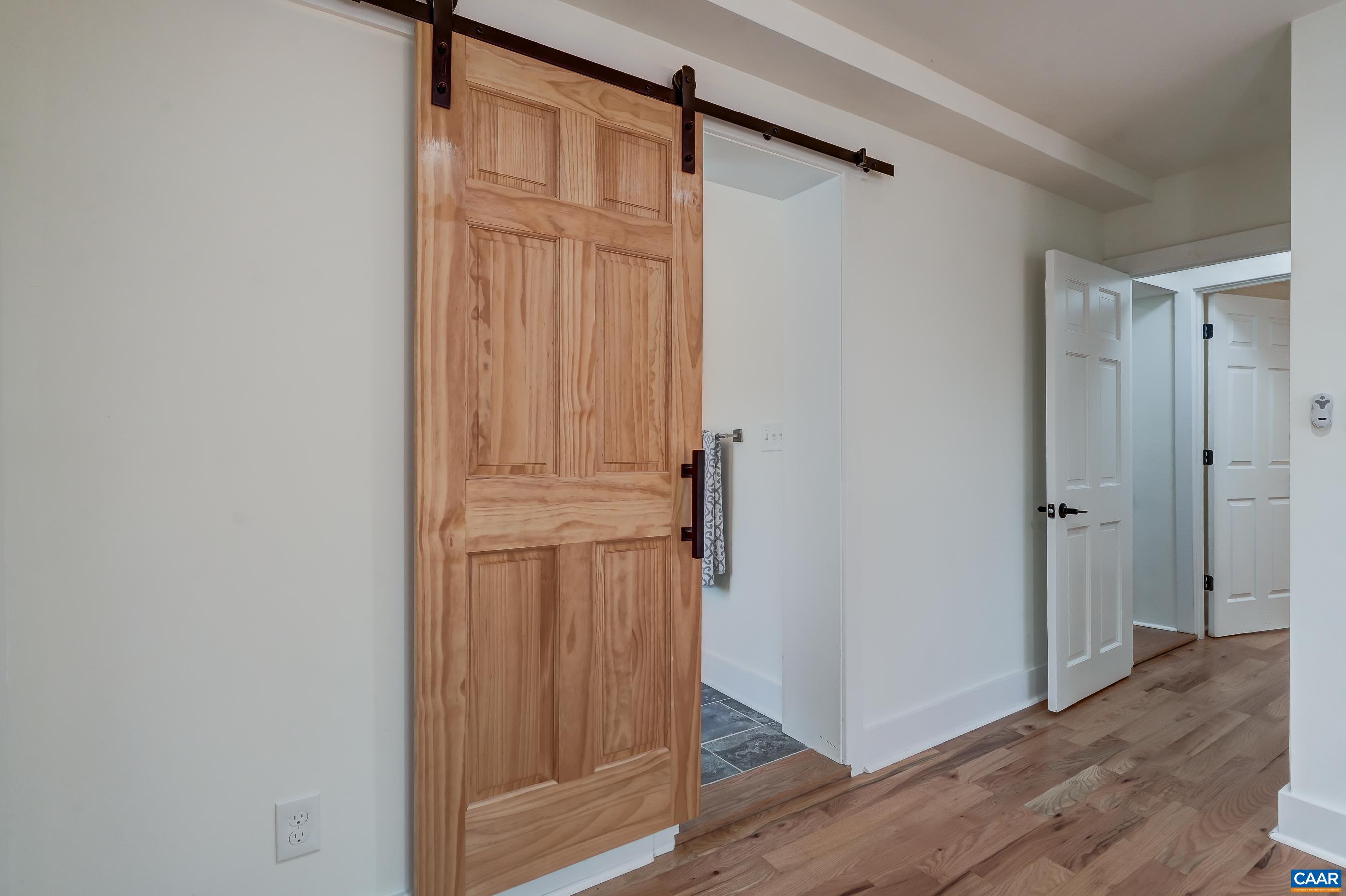 1407 Florence Road Charlottesville, VA 22902 - Photo 19 of 37 a view of front door with wooden floor