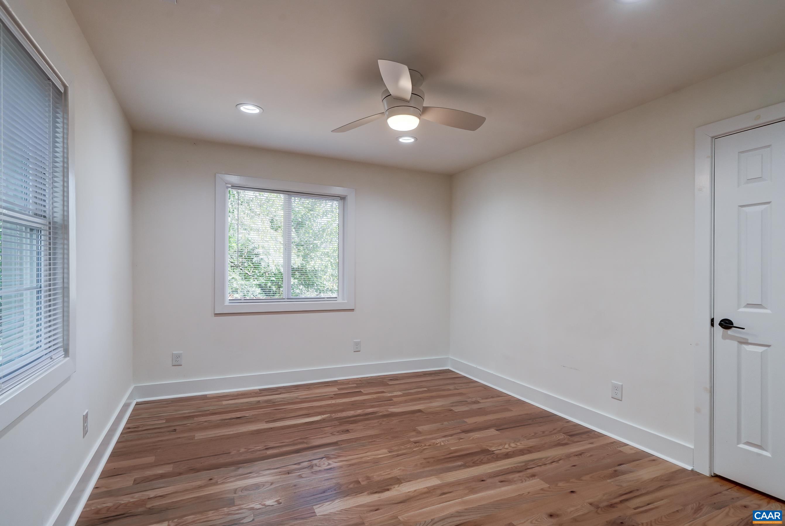 1407 Florence Road Charlottesville, VA 22902 - Photo 22 of 37 wooden floor in an empty room with a window