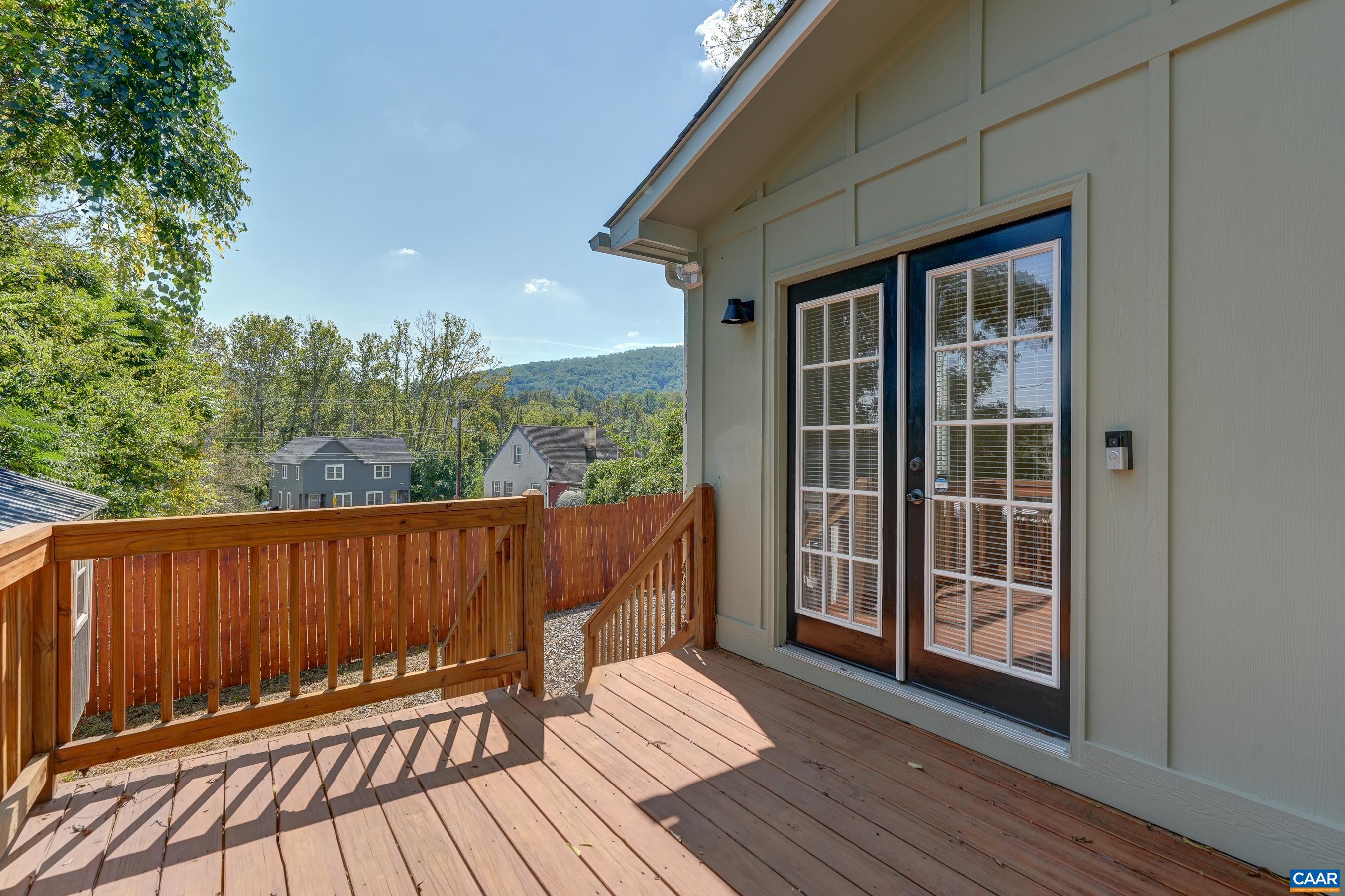 1407 Florence Road Charlottesville, VA 22902 - Photo 30 of 37 a view of deck with wooden floor and outdoor space