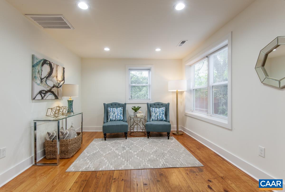 1407 Florence Road Charlottesville, VA 22902 - Photo 36 of 37 a living room with furniture and a table