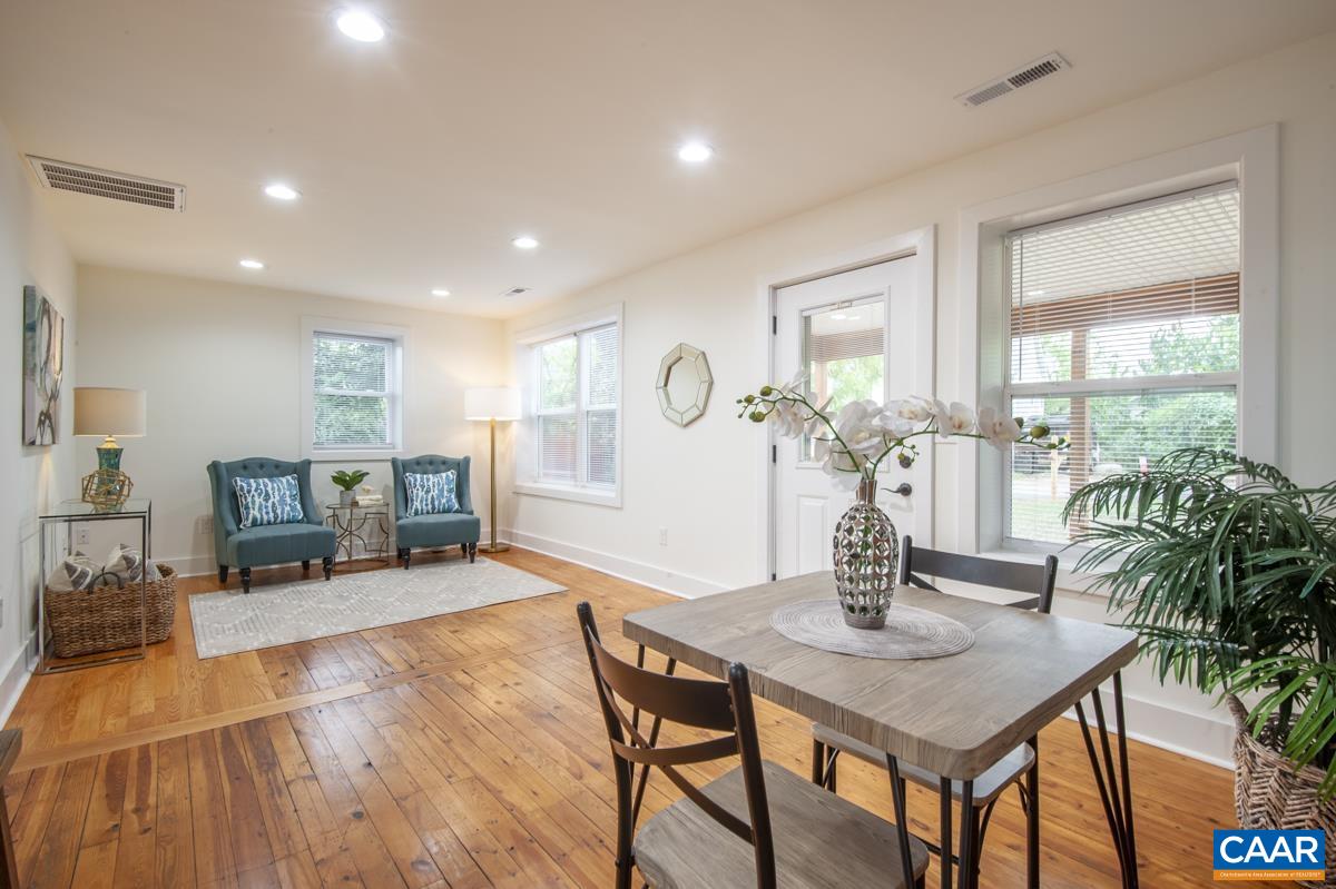 1407 Florence Road Charlottesville, VA 22902 - Photo 8 of 37 a view of a dining room with furniture and wooden floor