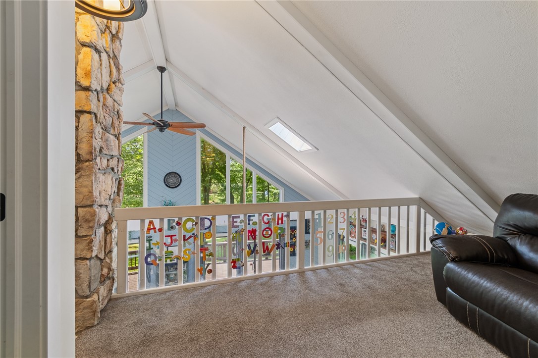 7733 East Port Bay Road Wolcott, NY 14590 - Photo 33 of 49 The loft that looks over the first floor level