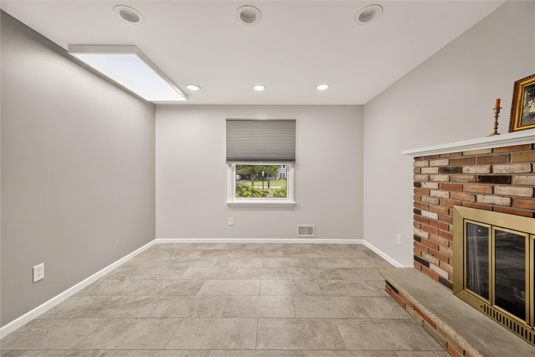 25 Whippletree Road Perinton, NY 14450 - Photo 25 of 44 Den/office with fireplace