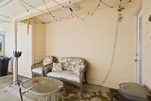 a living room with a couch and a table