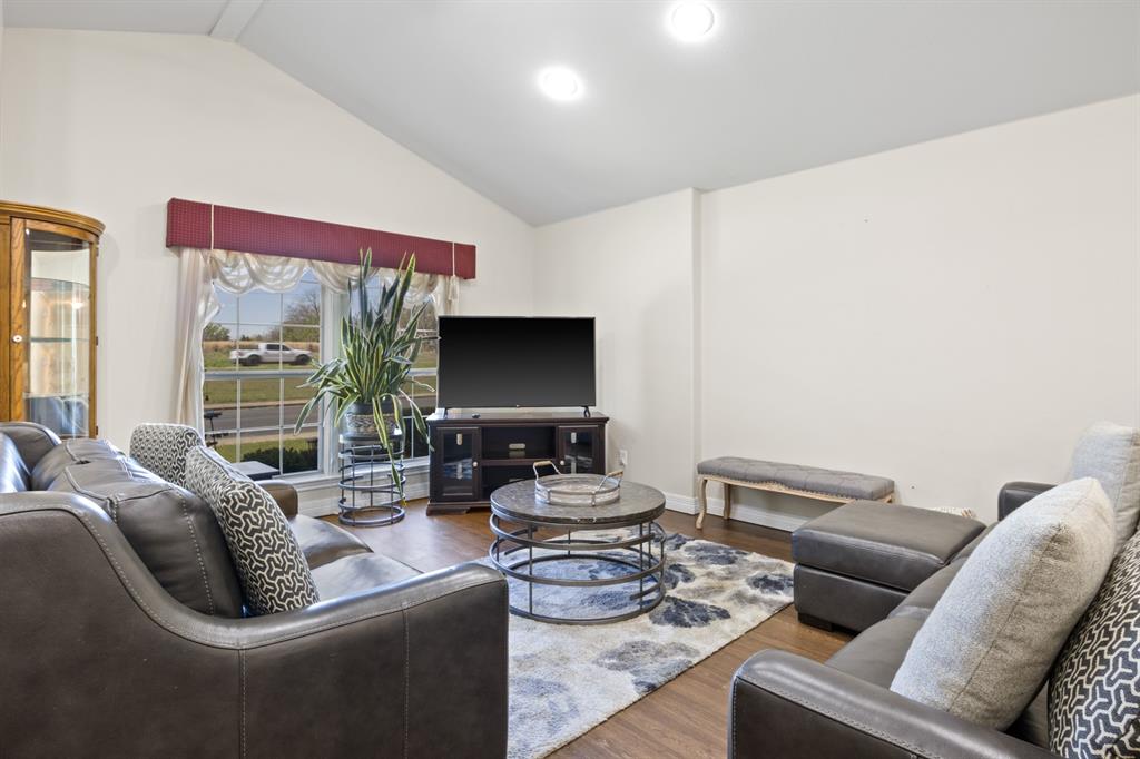 204 Pvt Road Mount Pleasant, TX 75455 - Photo 2 of 26 a living room with furniture and a large window