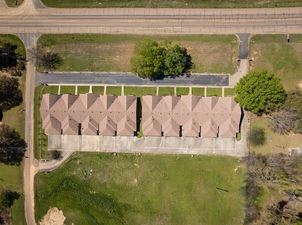 204 Pvt Road Mount Pleasant, TX 75455 - Photo 25 of 26 a view of swimming pool with a yard in the background