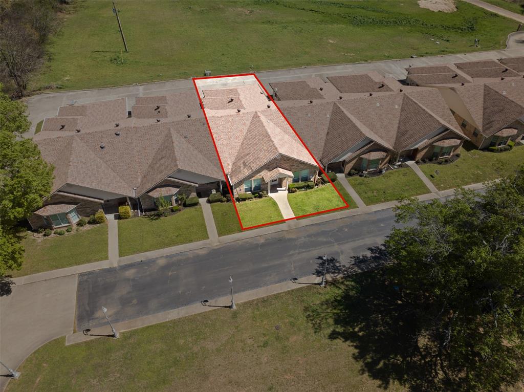 204 Pvt Road Mount Pleasant, TX 75455 - Photo 26 of 26 an aerial view of a house with a yard and lake view