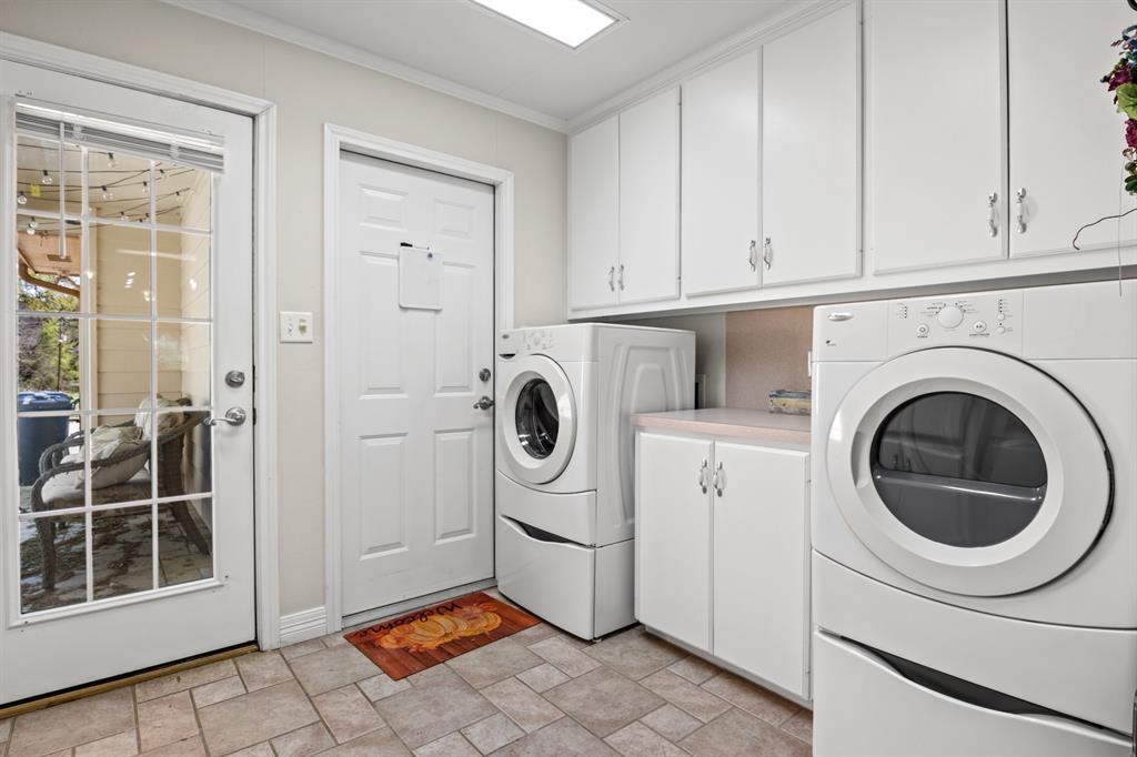 204 Pvt Road Mount Pleasant, TX 75455 - Photo 8 of 26 a utility room with dryer and washer