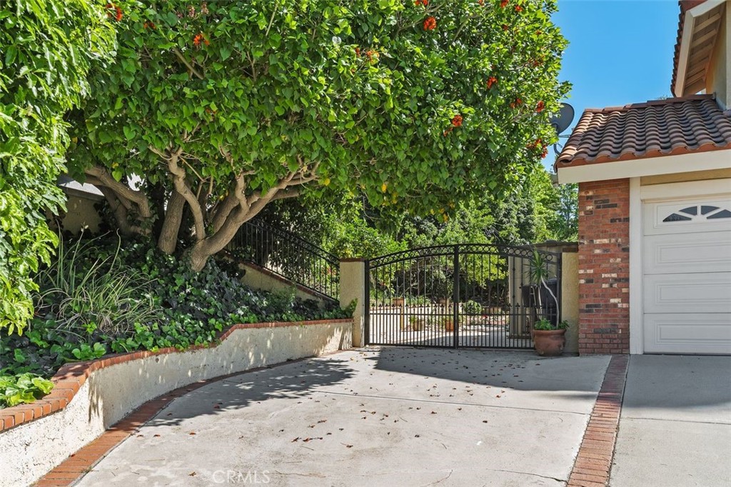305 Mission Grove Parkway North Riverside, CA 92506 - Photo 12 of 49 a view of a yard with plants and trees