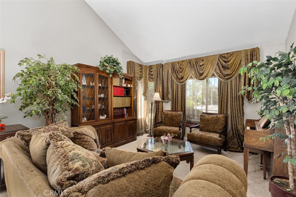 305 Mission Grove Parkway North Riverside, CA 92506 - Photo 16 of 49 a living room with furniture and a potted plant