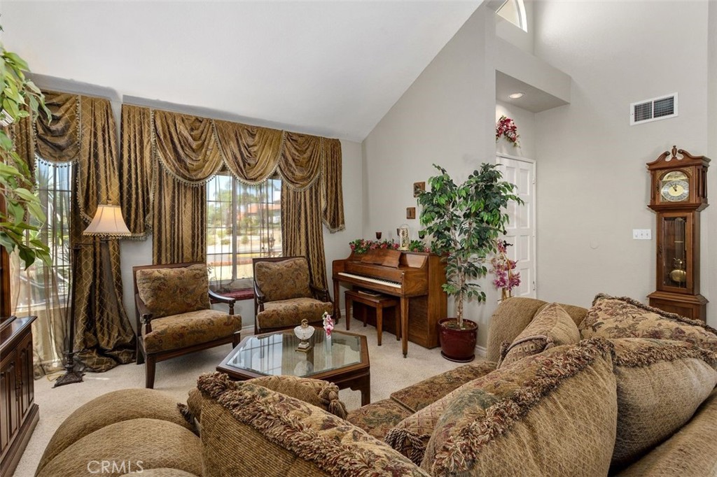 305 Mission Grove Parkway North Riverside, CA 92506 - Photo 17 of 49 a living room with furniture and a large window