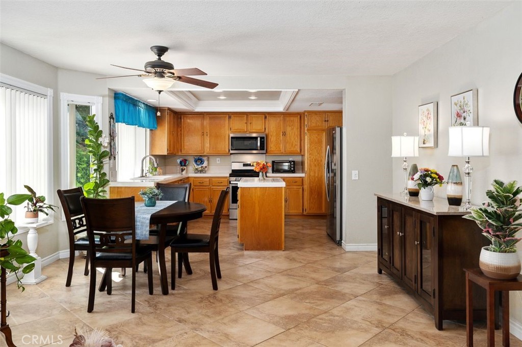 305 Mission Grove Parkway North Riverside, CA 92506 - Photo 23 of 49 a view of a dining room kitchen and furniture