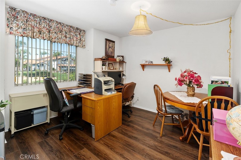 305 Mission Grove Parkway North Riverside, CA 92506 - Photo 33 of 49 a view of a dining room with furniture window and wooden floor