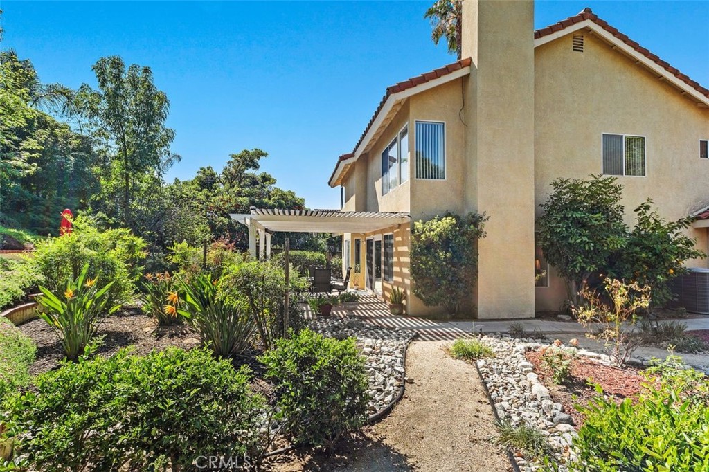 305 Mission Grove Parkway North Riverside, CA 92506 - Photo 44 of 49 a front view of house with yard